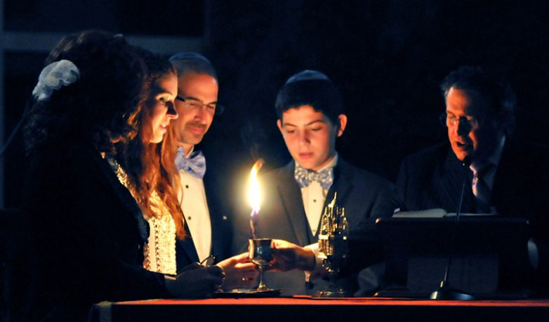 WJC Mitzvahs people lighting candle