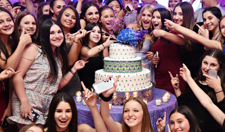 WJC Mitzvahs people dancing and cutting cake